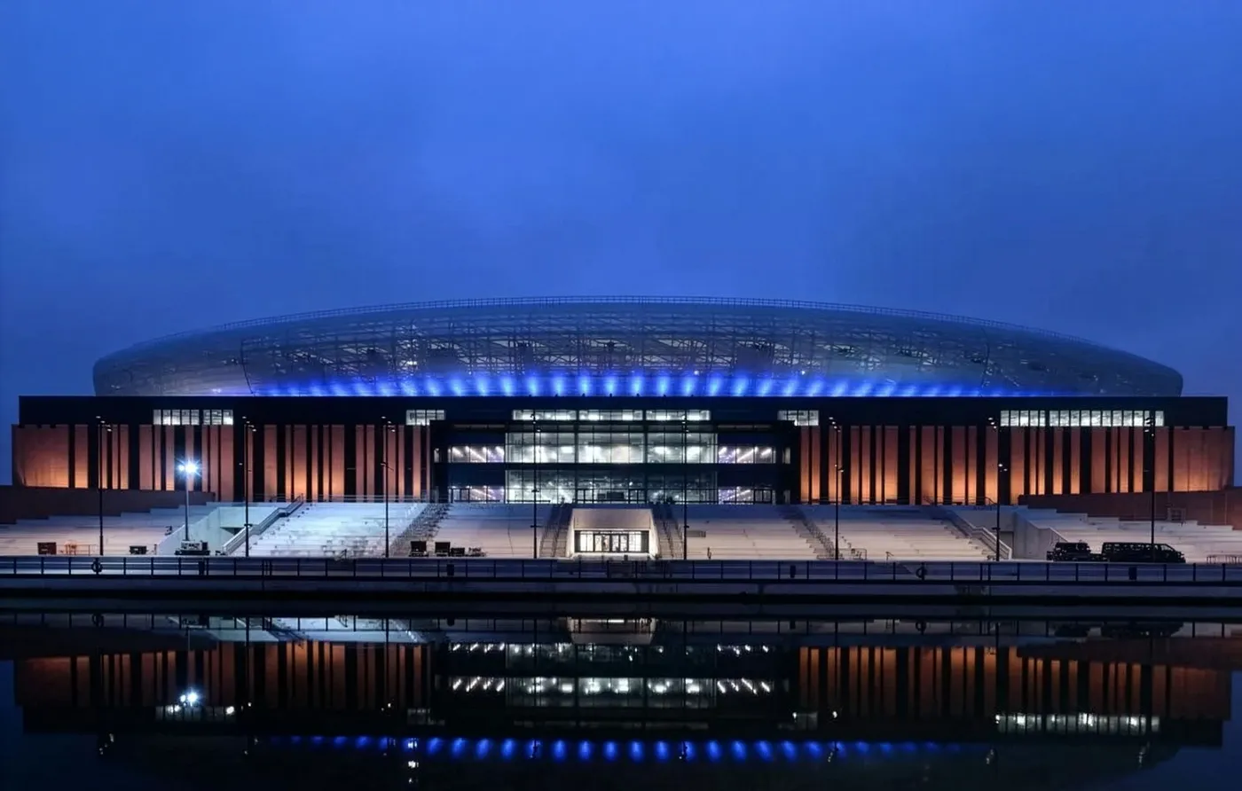Everton's Hill Dickinson Stadium lit up at dusk, the fire protection case study project on the waterfront